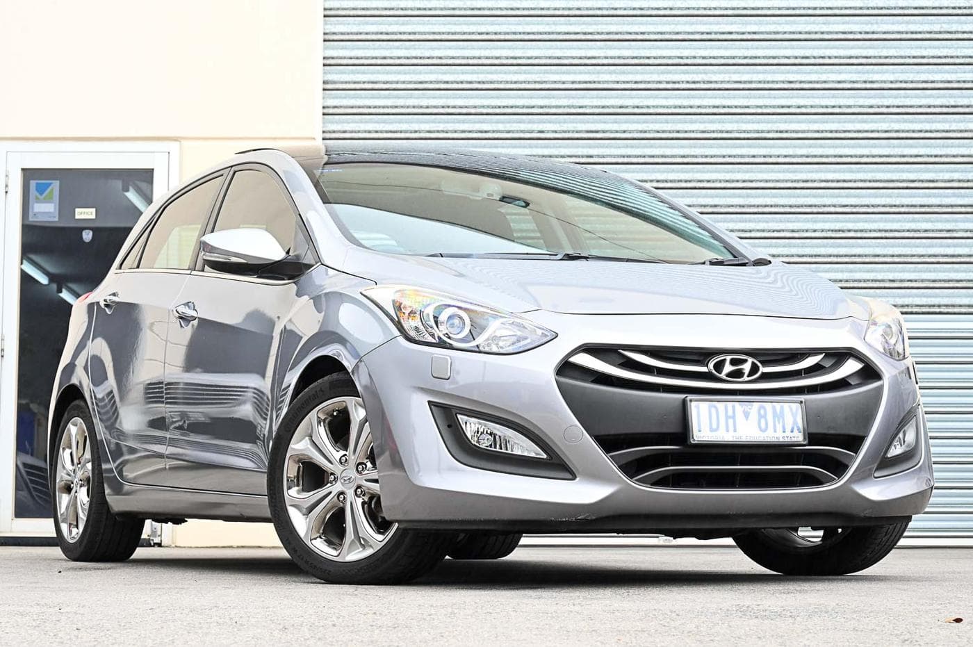 2014 Hyundai i30 Premium in silver — front three-quarter view at the Ripper Cars showroom in Springvale