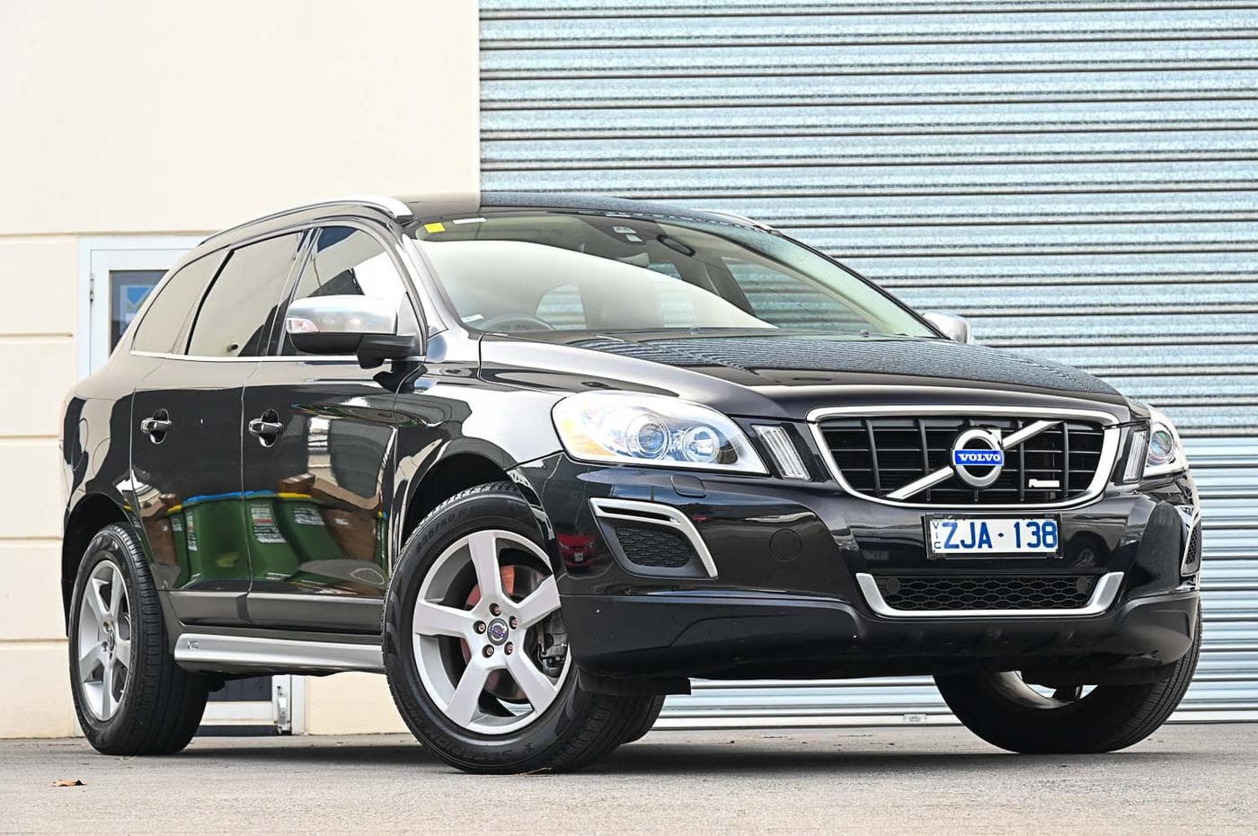 2012 Volvo XC60 D5 R-Design in black — front three-quarter view at the Ripper Cars showroom in Springvale
