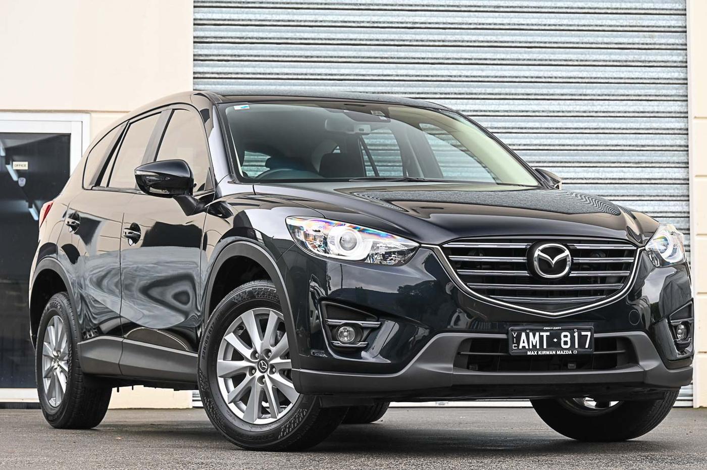 2017 Mazda CX-5 Maxx Sport in black — front three-quarter view at the Ripper Cars showroom in Springvale
